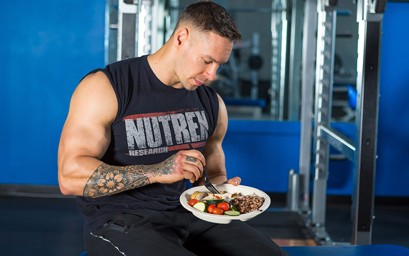 Nutrex athlete enjoying a home cooked meal