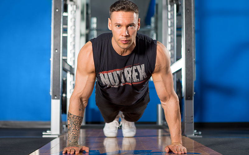 Nutrex Male Athlete Practicing Yoga