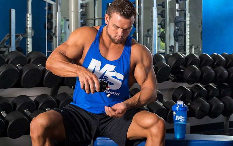 Pouring Fat Loss Supplements into Hand