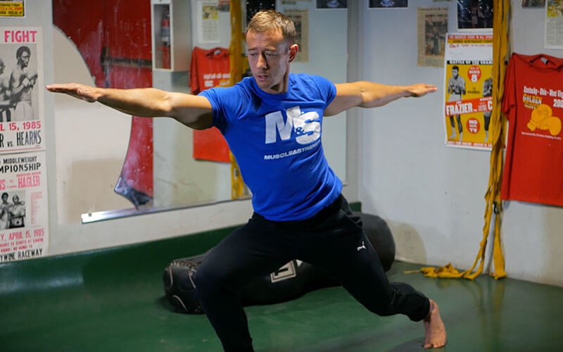 Coach Myers Warrior Pose in Yoga for Meatheads