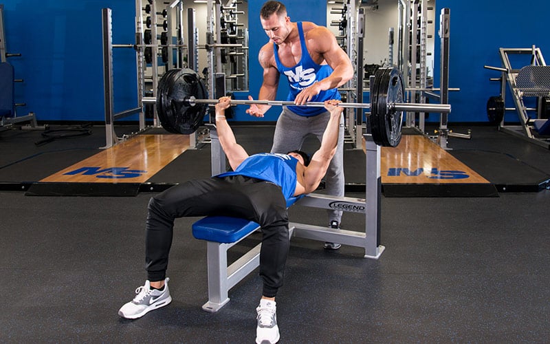 Man Bench Pressing