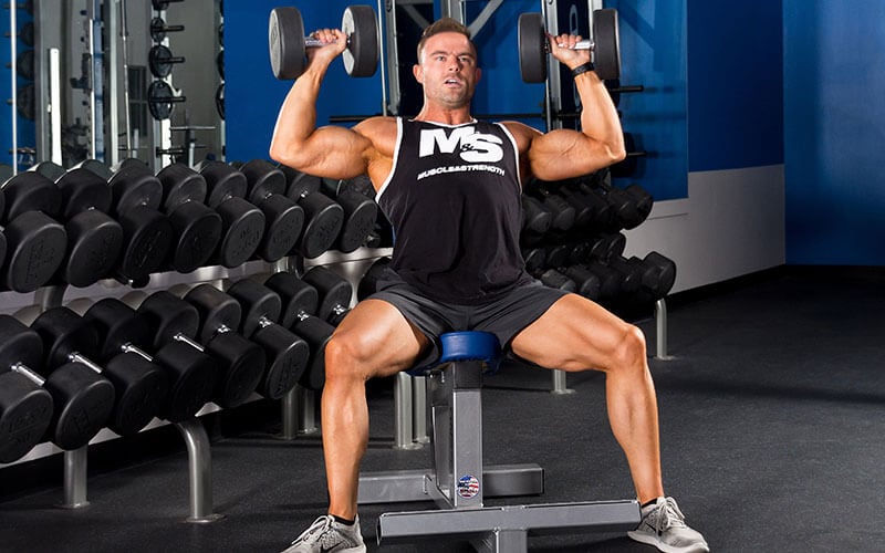 M&S and Dymatize Athlete Brett Kahn Performing Dumbbell Shoulder Press