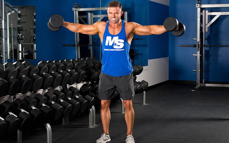 M&S Athlete Perfroming Dumbbell Lateral Raises
