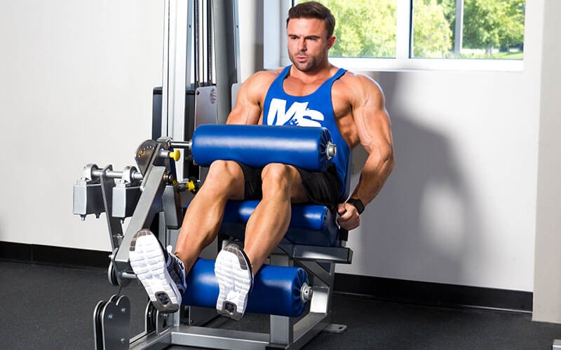 M&S Athlete Performing Seated Leg Curls