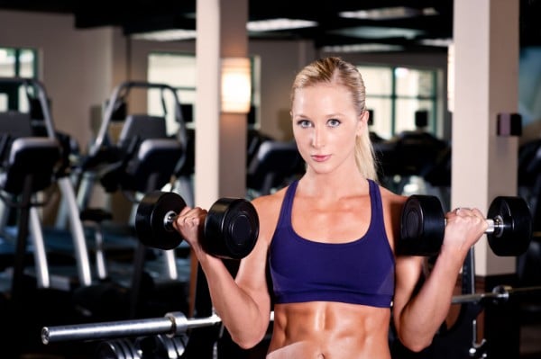 Female Performing Dumbbell Curls