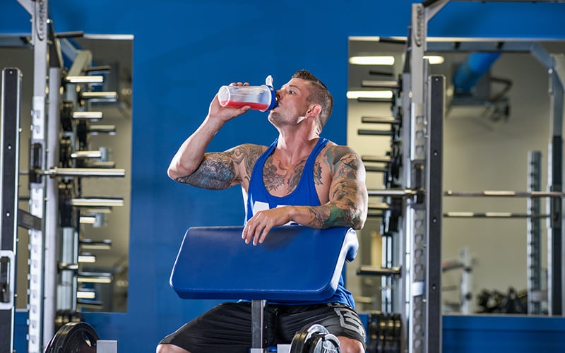 Man drinking homemade stimulant pre-workout supplement