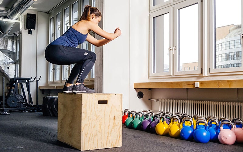 Girl performing Box Jumps for Plyometric exercises