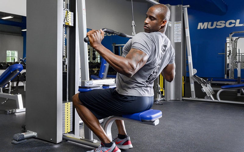 Muscle & Strength Athlete Doing Lat Pulldowns