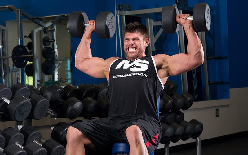 Tweaked Back Seated Dumbbell Press