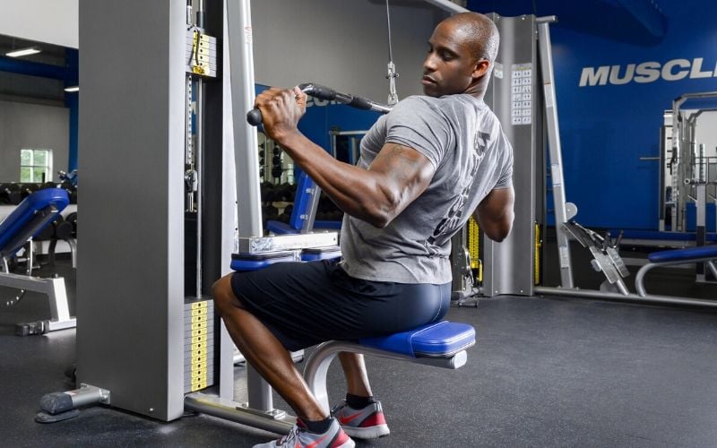 Muscle & Strength Athlete Doing Lat Pulldowns