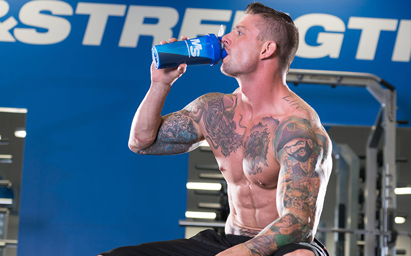 Post Workout Nutrition Drinking from Shaker