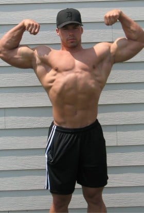 Derek Charlesbois, front double biceps pose.