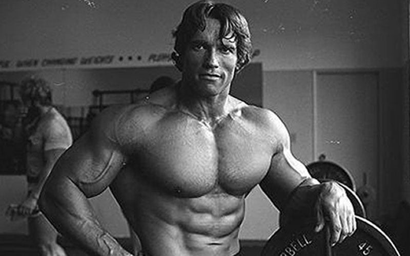 Arnold Schwarzeneggar powerlifted and body built